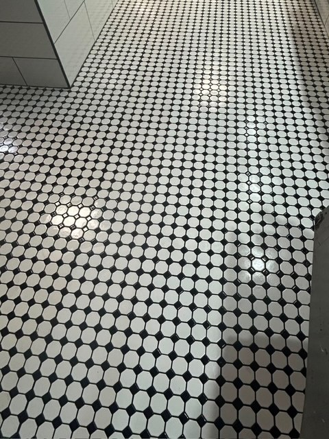 Close-up of black and white octagon mosaic tile floor